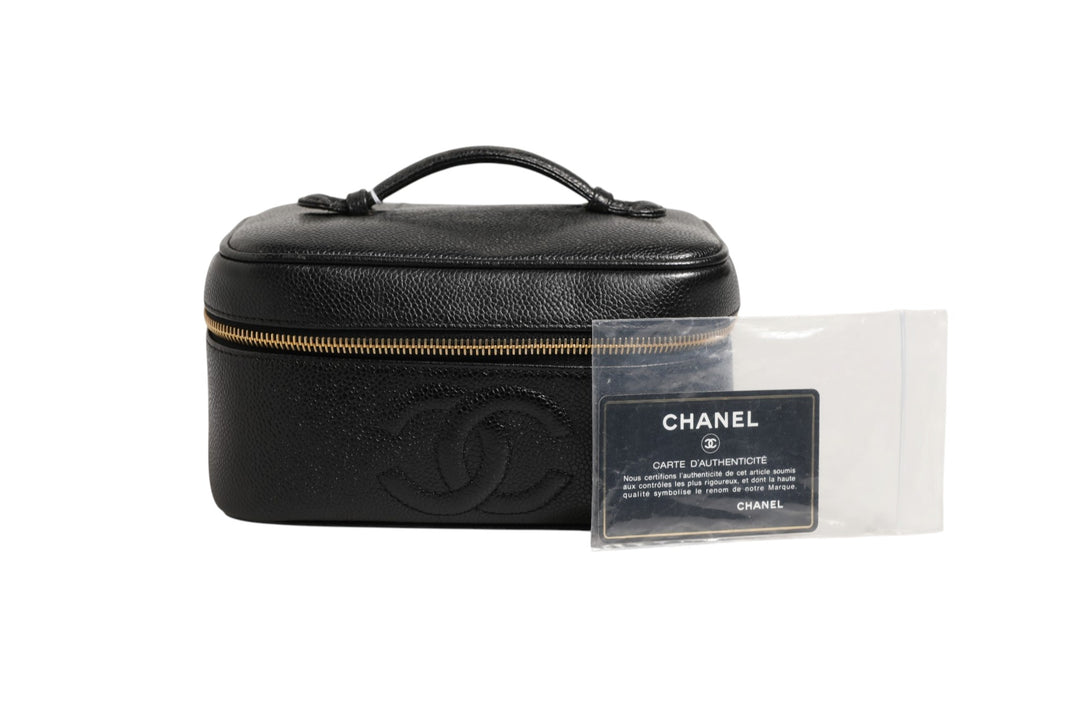 Black and gold makeup bag Chanel