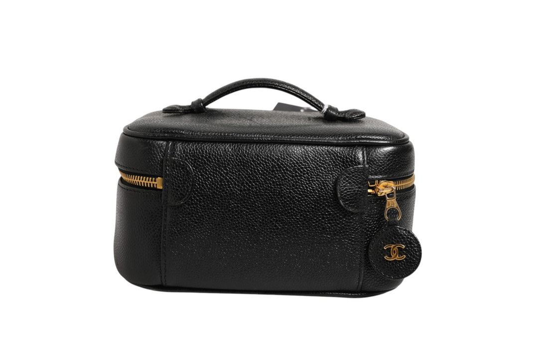 Black and gold makeup bag Chanel