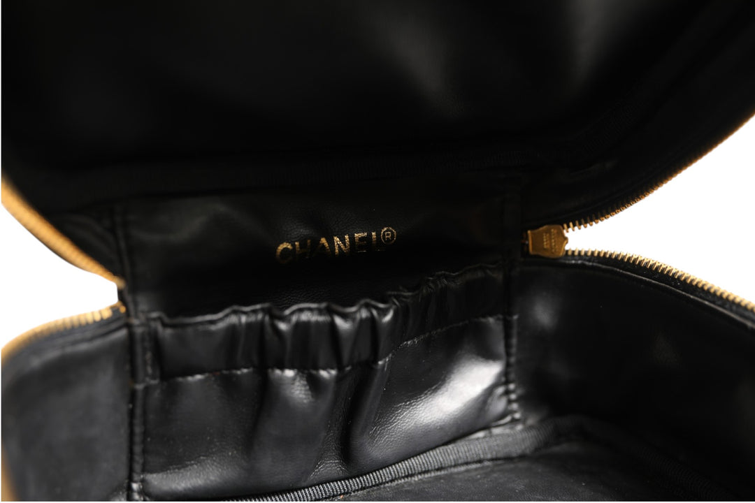 Black and gold makeup bag Chanel
