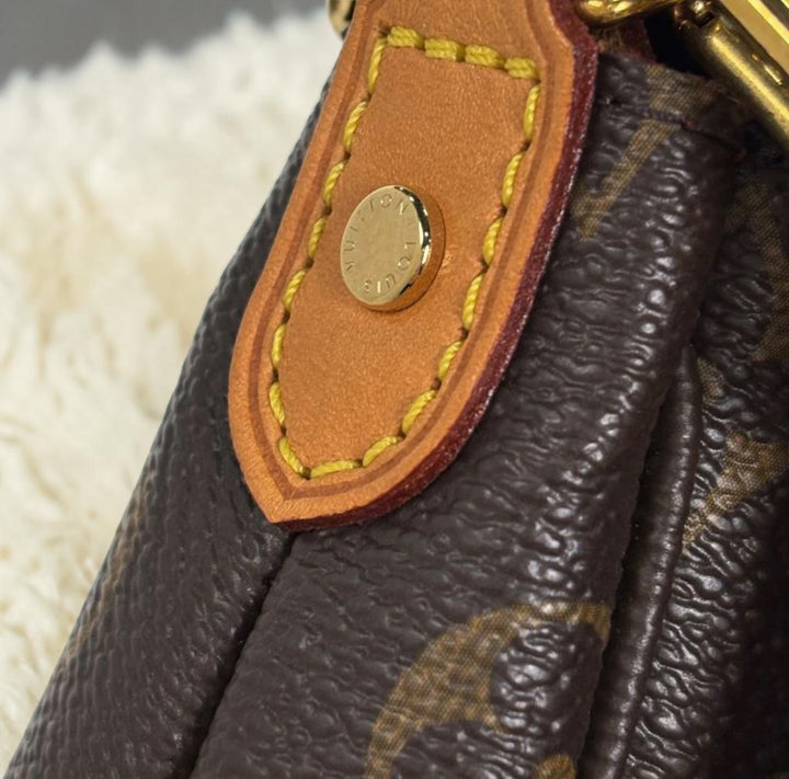 Pre-loved, Louis Vuitton vintage favorite mm the layla edit.